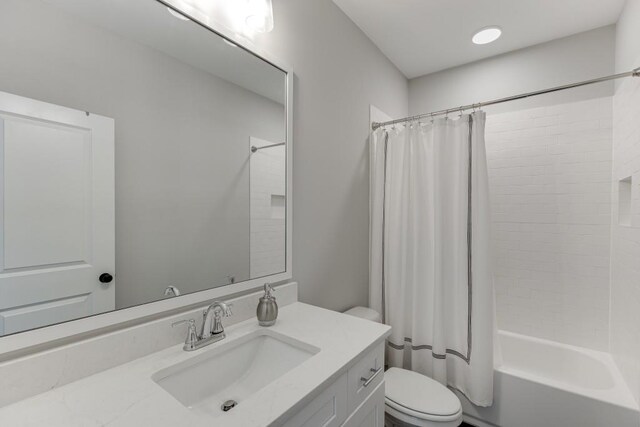4781 Falling Brook Dr, Flowery Branch, GA 30542 - full bathroom with vanity, toilet, and shower / tub combo with curtain