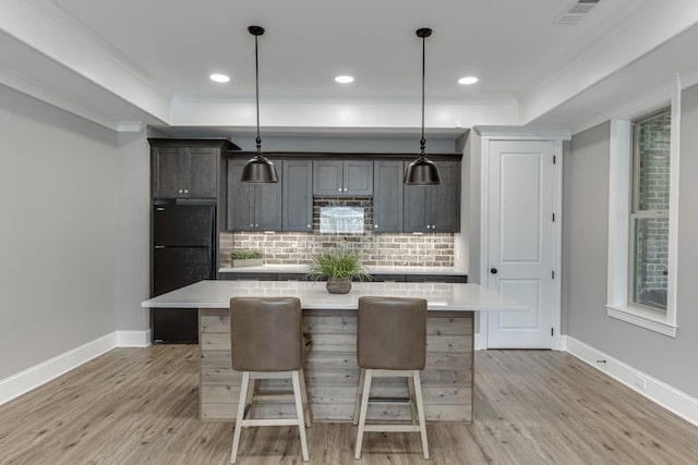 4781 Falling Brook Dr, Flowery Branch, GA 30542 - kitchen featuring baseboards, light countertops, tasteful backsplash, crown molding, and recessed lighting