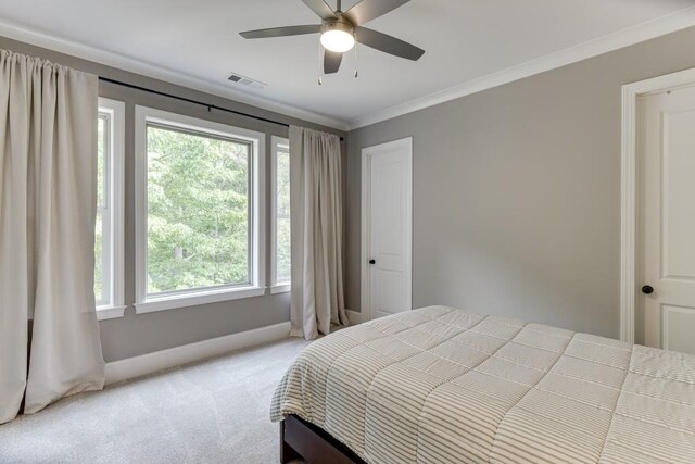 4781 Falling Brook Dr, Flowery Branch, GA 30542 - bedroom with baseboards, light carpet, ornamental molding, and a ceiling fan