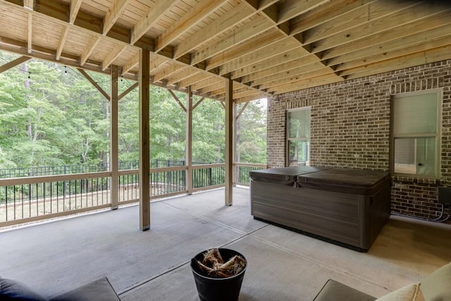 4781 Falling Brook Dr, Flowery Branch, GA 30542 - fenced backyard featuring a hot tub and a patio area