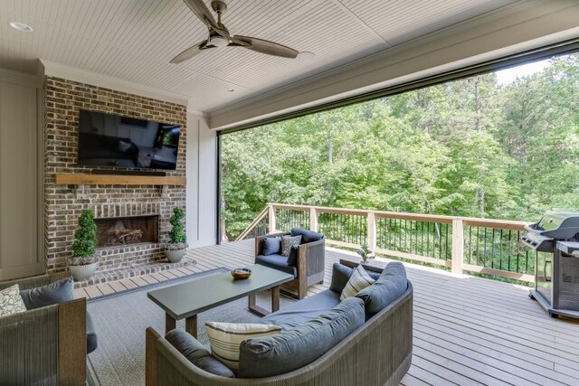 4781 Falling Brook Dr, Flowery Branch, GA 30542 - deck featuring an outdoor living space with a fireplace, ceiling fan, and a grill
