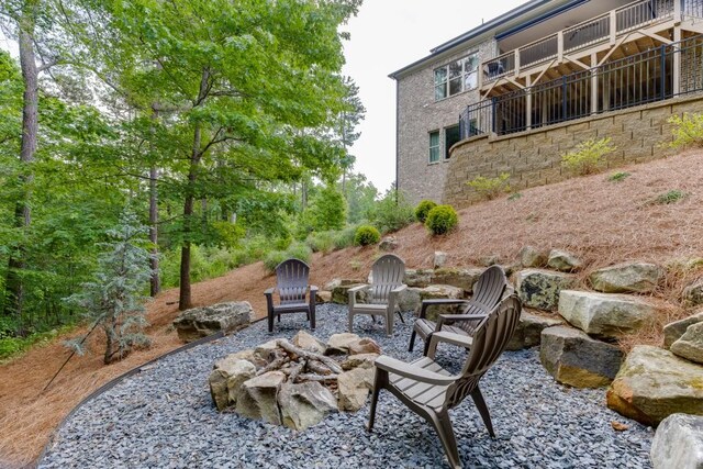 4781 Falling Brook Dr, Flowery Branch, GA 30542 - view of patio / terrace featuring a fire pit