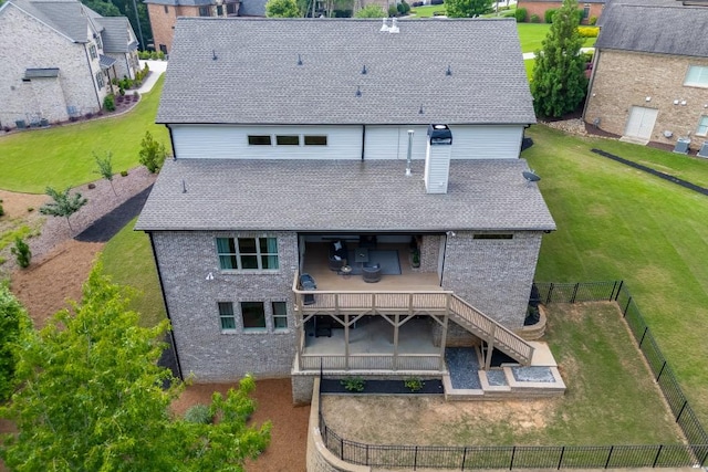 4781 Falling Brook Dr, Flowery Branch, GA 30542 - back of property featuring a patio area, roof with shingles, and a deck