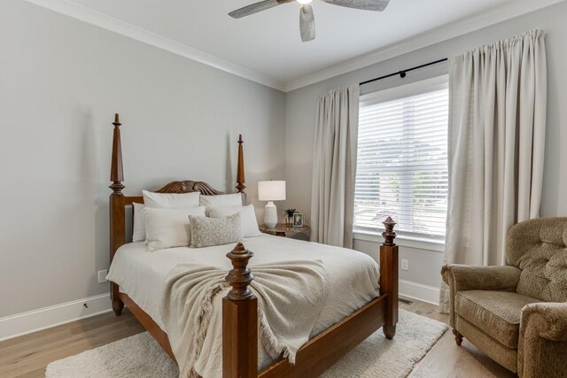 4781 Falling Brook Dr, Flowery Branch, GA 30542 - bedroom with baseboards, light wood finished floors, ornamental molding, and ceiling fan