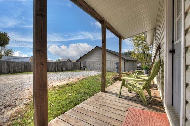 wooden deck with a yard