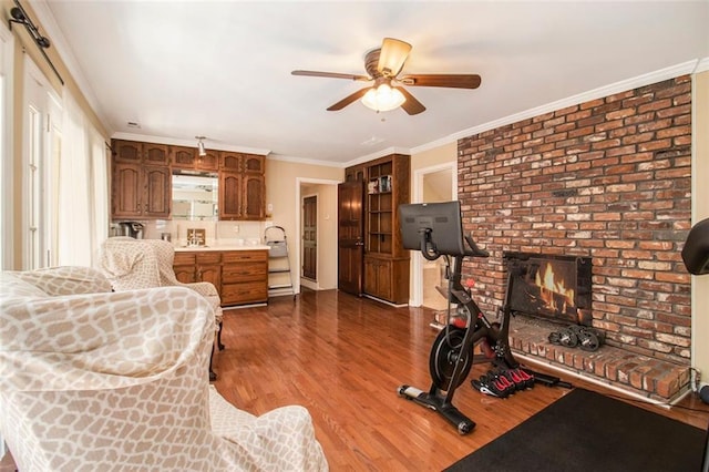 1935 Northbrooke Ln, Dunwoody, GA 30338 - exercise room with ceiling fan, wood finished floors, and ornamental molding