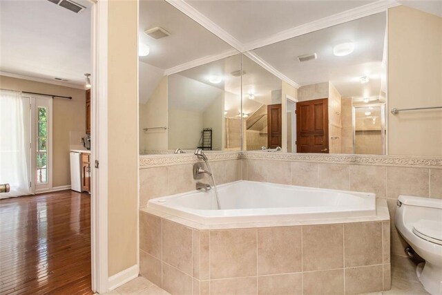1935 Northbrooke Ln, Dunwoody, GA 30338 - bathroom featuring a garden tub, toilet, crown molding, baseboards, and a shower