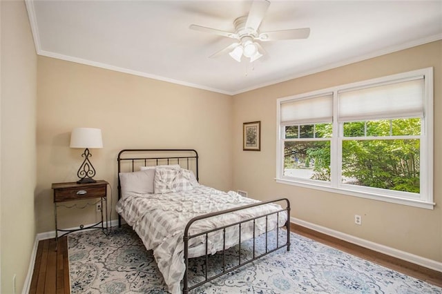 1935 Northbrooke Ln, Dunwoody, GA 30338 - bedroom with wood finished floors, baseboards, crown molding, and a ceiling fan