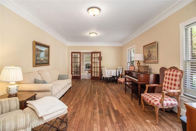 1935 Northbrooke Ln, Dunwoody, GA 30338 - living area featuring ornamental molding, dark wood finished floors, and french doors