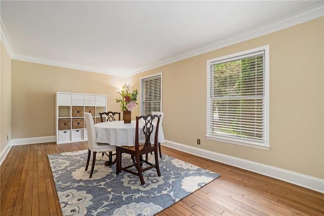 1935 Northbrooke Ln, Dunwoody, GA 30338 - dining area with ornamental molding, hardwood / wood-style flooring, and baseboards