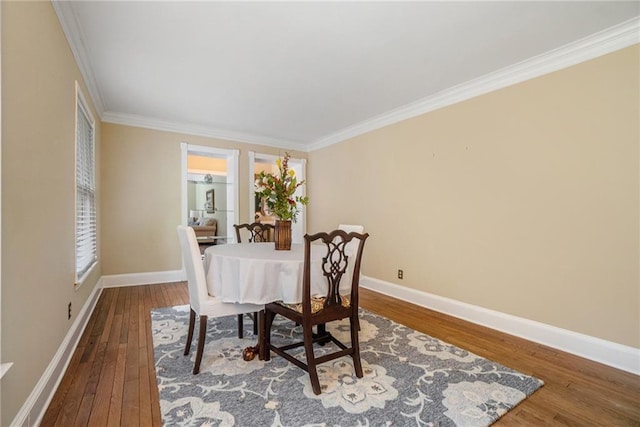 1935 Northbrooke Ln, Dunwoody, GA 30338 - dining space with hardwood / wood-style floors, crown molding, and baseboards