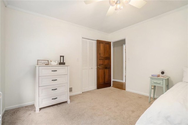 1935 Northbrooke Ln, Dunwoody, GA 30338 - bedroom with light colored carpet, ornamental molding, baseboards, and a closet