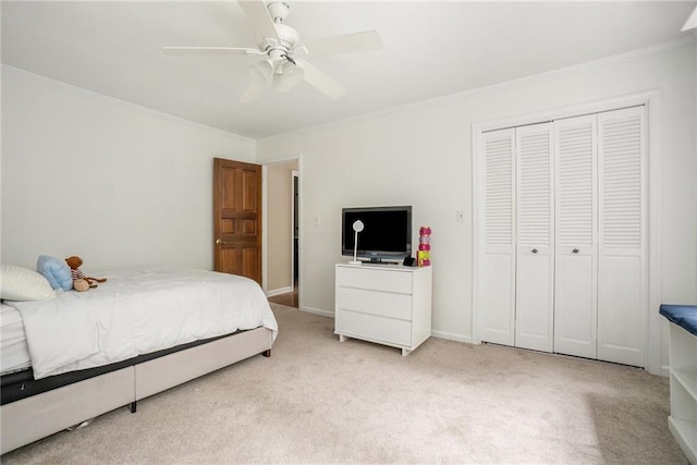 1935 Northbrooke Ln, Dunwoody, GA 30338 - bedroom with crown molding, light carpet, a closet, and a ceiling fan