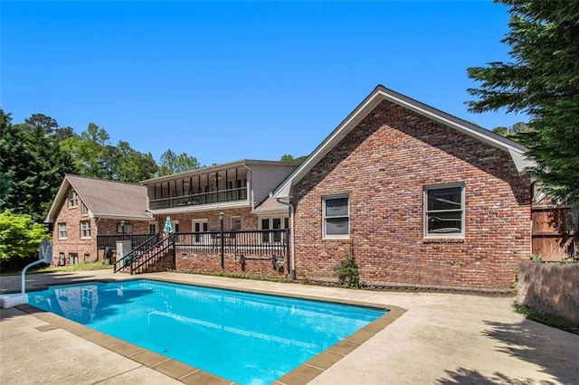 1935 Northbrooke Ln, Dunwoody, GA 30338 - view of swimming pool with stairway and a patio area