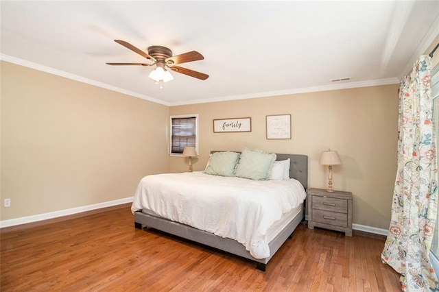 1935 Northbrooke Ln, Dunwoody, GA 30338 - bedroom featuring baseboards, wood finished floors, ornamental molding, and ceiling fan
