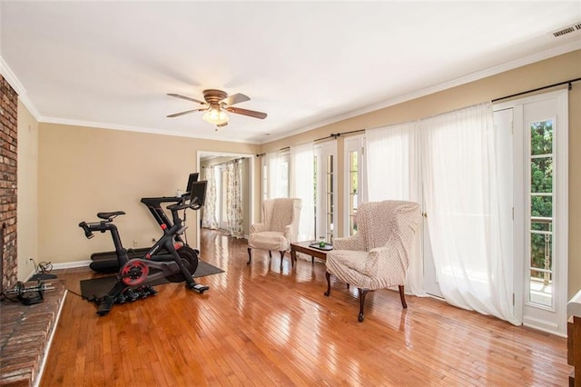 1935 Northbrooke Ln, Dunwoody, GA 30338 - workout room featuring wood-type flooring, ornamental molding, ceiling fan, and baseboards