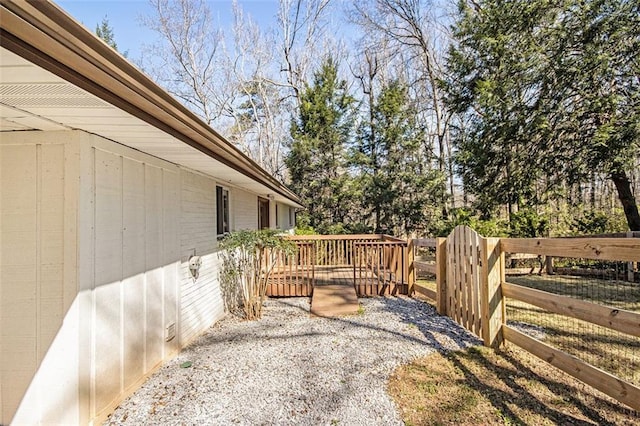 view of yard with a wooden deck