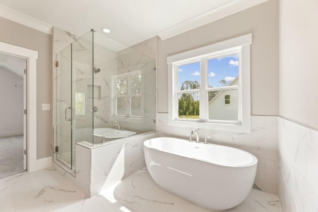 4525 Aiden Way, Cumming, GA 30041 - full bath featuring marble tiled flooring, a freestanding tub, a marble finish shower, and recessed lighting