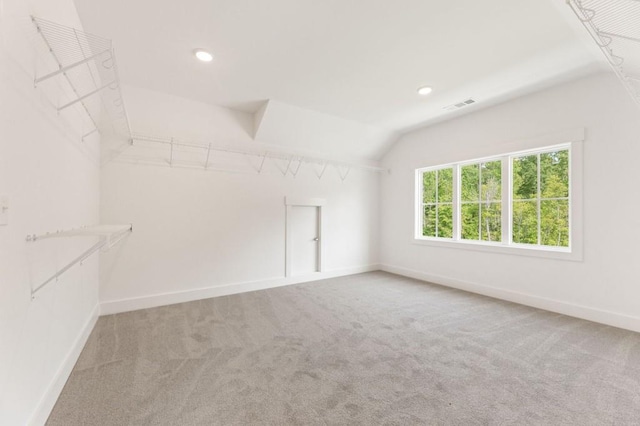 4525 Aiden Way, Cumming, GA 30041 - spacious closet with carpet flooring and lofted ceiling