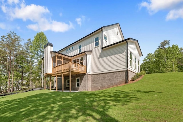 4525 Aiden Way, Cumming, GA 30041 - back of property featuring brick siding, a yard, a deck, a chimney, and a patio