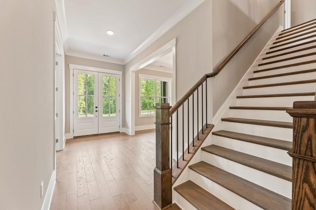 4525 Aiden Way, Cumming, GA 30041 - entrance foyer featuring stairs, ornamental molding, wood finished floors, and recessed lighting