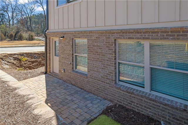 view of property exterior featuring a patio