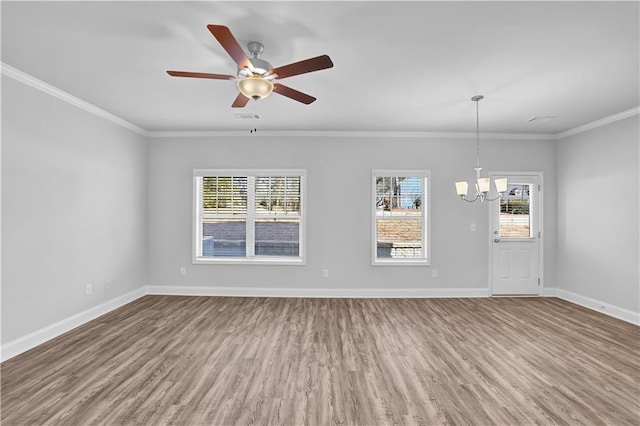 unfurnished room featuring ornamental molding, wood-type flooring, and ceiling fan with notable chandelier