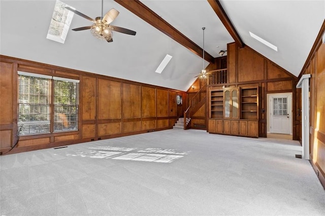 4116 River Cliff Chase SE, Marietta, GA 30067 - stairway with a fireplace, a textured ceiling, a ceiling fan, carpet floors, and vaulted ceiling with beams