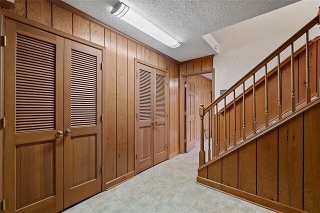 4116 River Cliff Chase SE, Marietta, GA 30067 - wine cellar featuring a textured ceiling, built in features, wooden walls, and visible vents