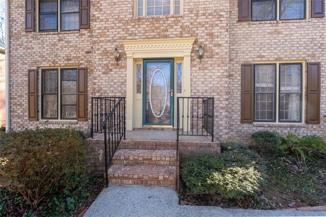 4116 River Cliff Chase SE, Marietta, GA 30067 - colonial house with brick siding, fence, and roof with shingles