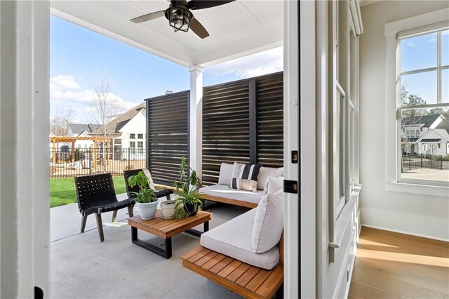 view of patio featuring ceiling fan