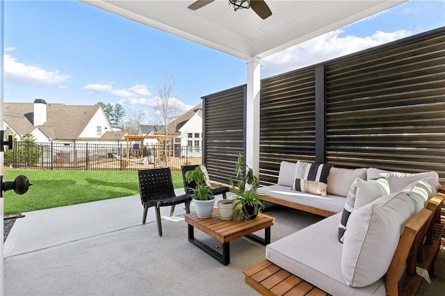 view of patio with an outdoor hangout area and ceiling fan