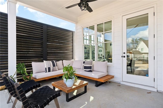 view of patio / terrace with an outdoor living space and ceiling fan