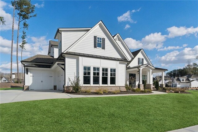 property entrance with covered porch and a yard