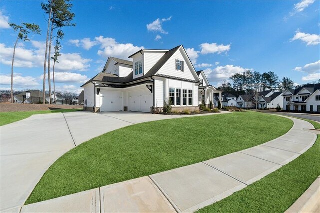 back of house featuring a lawn and a patio