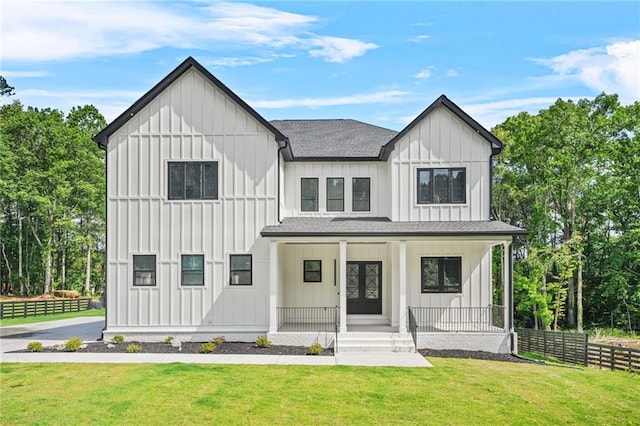 5175 Cascade Rd, Atlanta, GA 30331 - modern inspired farmhouse featuring board and batten siding, a shingled roof, and a porch