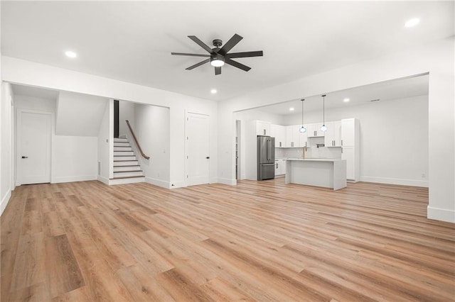 5175 Cascade Rd, Atlanta, GA 30331 - unfurnished living room with recessed lighting, ceiling fan, stairs, baseboards, and light wood-style flooring