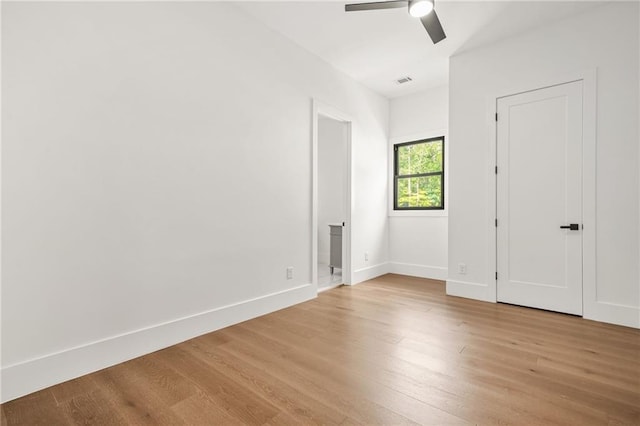5175 Cascade Rd, Atlanta, GA 30331 - unfurnished bedroom with light wood finished floors, baseboards, ensuite bathroom, and ceiling fan