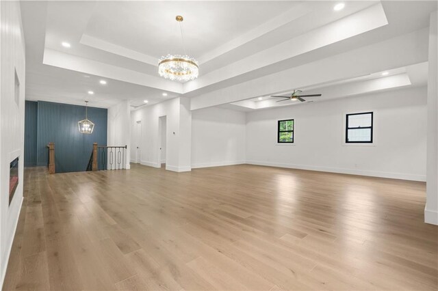 5175 Cascade Rd, Atlanta, GA 30331 - unfurnished room with a chandelier, a tray ceiling, light wood-style flooring, recessed lighting, and ceiling fan