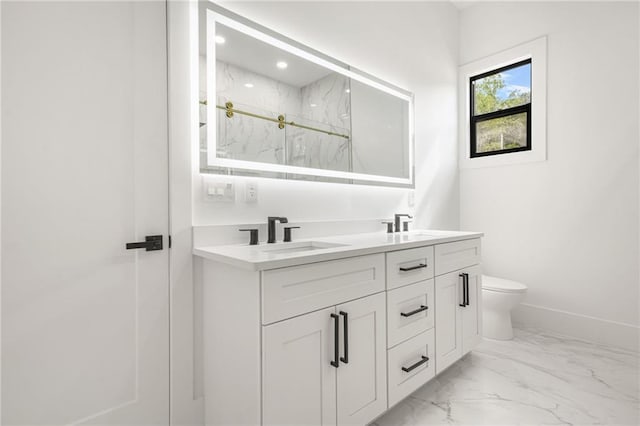 5175 Cascade Rd, Atlanta, GA 30331 - full bathroom featuring marble look tiles, a marble finish shower, double vanity, toilet, and baseboards