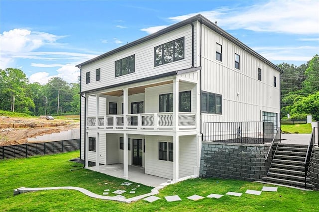 5175 Cascade Rd, Atlanta, GA 30331 - rear view of house featuring stairway, a patio area, and a balcony