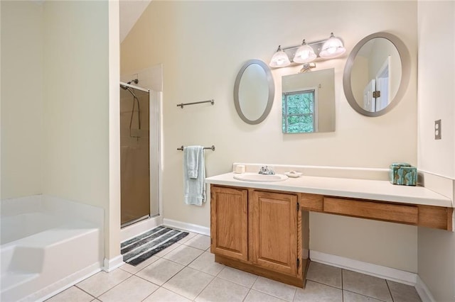 full bath featuring tile patterned flooring, a stall shower, vanity, and a bath