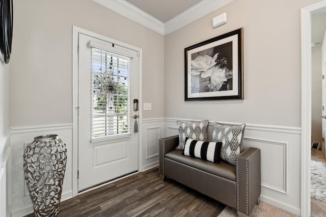 foyer entrance featuring dark hardwood / wood-style floors and crown molding