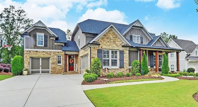 craftsman-style house with a front lawn and a garage