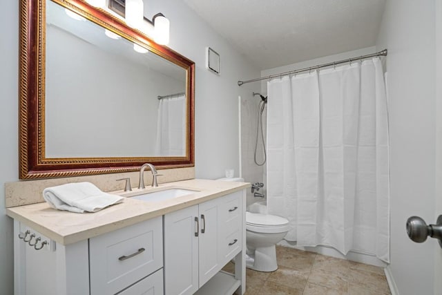 full bathroom featuring vanity, shower / bath combo with shower curtain, and toilet