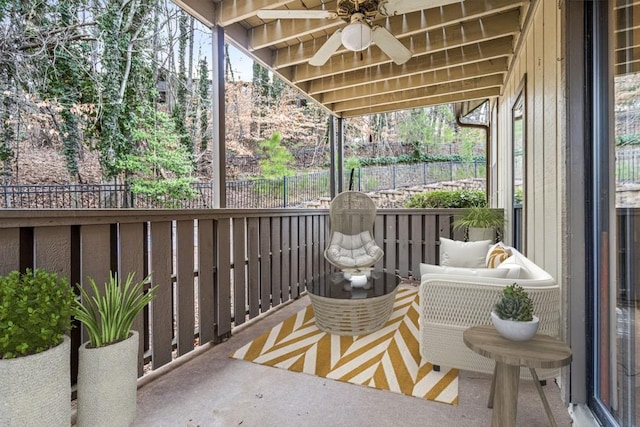 balcony featuring ceiling fan