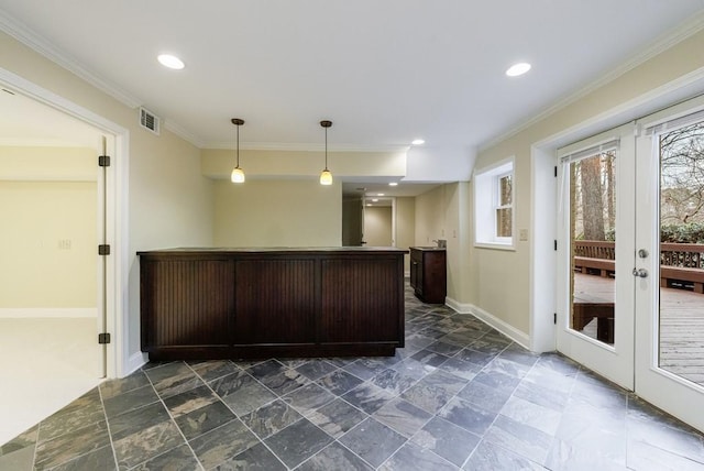 bar with pendant lighting, crown molding, dark brown cabinets, and french doors