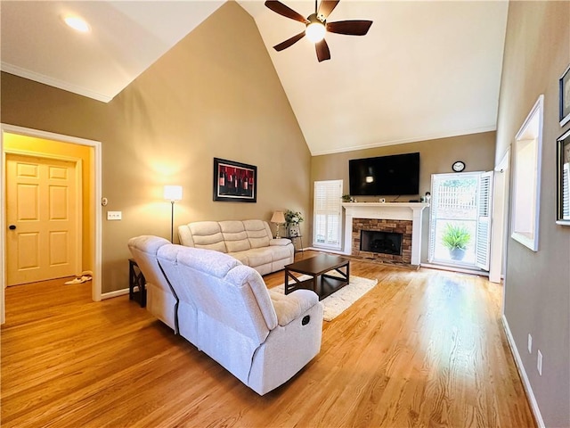 1739 Praters Pt, Dacula, GA 30019 - living area featuring ceiling fan, light wood-style flooring, high vaulted ceiling, healthy amount of natural light, and baseboards