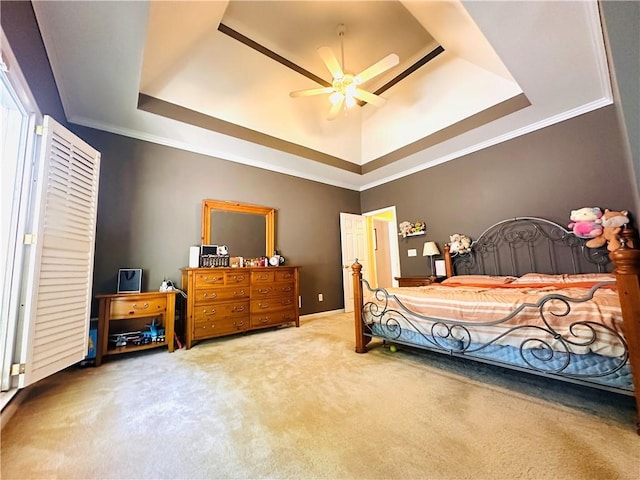 1739 Praters Pt, Dacula, GA 30019 - bedroom with a tray ceiling, carpet flooring, crown molding, and ceiling fan