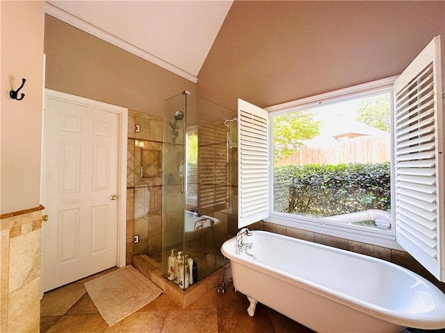 1739 Praters Pt, Dacula, GA 30019 - full bath featuring a shower stall, a freestanding bath, crown molding, lofted ceiling, and tile patterned floors